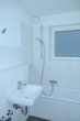 Badezimmer - Kernsanierte 2,5-Zimmer-Wohnung im EG mit EBK, Duschbad