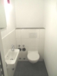 Gäste WC - Kapitalanlage mit Balkon – vermietete 4-Zimmer-Wohnung über zwei Etagen inkl. Stellplatz