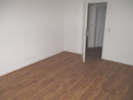 Schlafzimmer - Kapitalanlage mit Balkon – vermietete 4-Zimmer-Wohnung über zwei Etagen inkl. Stellplatz