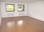 Aufenthaltsraum Souterrain - Kapitalanlage mit Balkon – vermietete 4-Zimmer-Wohnung über zwei Etagen inkl. Stellplatz