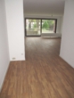Wohnzimmer und Flur - Kapitalanlage mit Balkon – vermietete 4-Zimmer-Wohnung über zwei Etagen inkl. Stellplatz