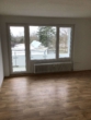Wohnzimmer - Rotenburg/Wümme – 2,5-Zimmer-Wohnung mit neuer Einbauküche und Balkon